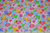 Baumwoll-Jersey mit buntem Herz-Print – Elastischer Stoff für kreative Nähprojekte Baumwoll-Jersey mit buntem Herz-Print – Elastischer Stoff für kreative Nähprojekte