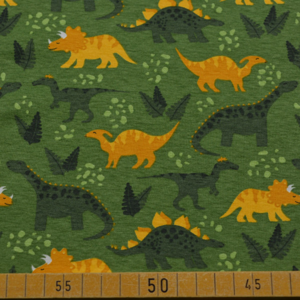 Baumwoll Jersey – Dinosaurier auf Grün | Kinderstoff aus Baumwolle mit Elasthan