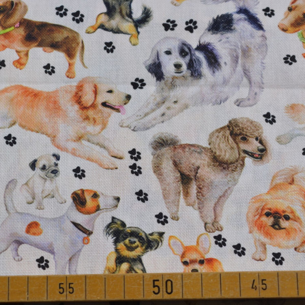 Dekostoff Hunde bunt | Hunderassen & Pfoten auf Weiß, 100% Baumwolle, 200 g/m², 140 cm breit